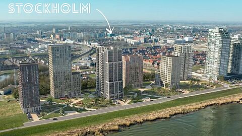 Impressie woontorens aan de Oude Maas in Spijkenisse, met in het midden gebouw Stockholm