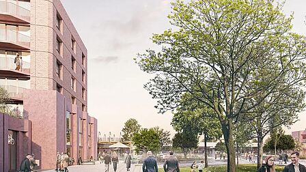 Impressie nieuwbouwproject New Haven. Zalmkleurig gebouw met veel balkons, tegenover metrostation Spijkenisse Centrum.