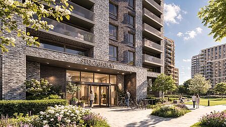 Impressie entree woongebouw Stockholm met buitenruimte.