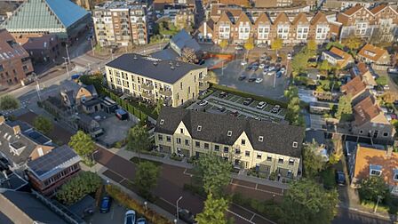 Vredehof: appartementen en gezinswoningen aan de Vredehofstraat in het centrum van Spijkenisse. Dit is impressie vanuit de lucht.