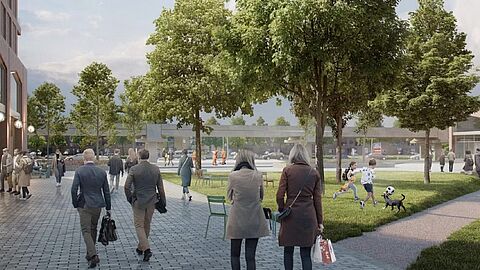 Impressie nieuwbouwproject New Haven. Zalmkleurig gebouw met veel mensen die vanuit het park naar de metro lopen.