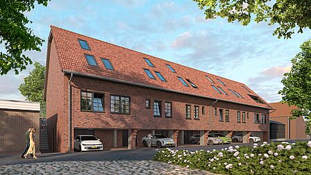 Dorpshoeve vanaf de zijkant, met de landelijke bruinrode bakstenen en pannen.