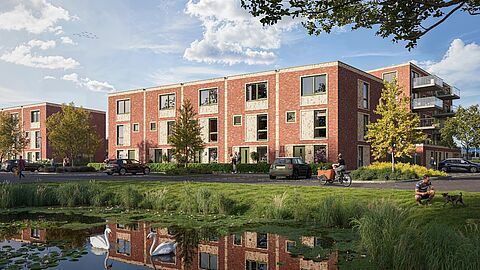 Eengezinswoningen met platte daken aan het water in De Groene Warande (fase 2) in Spijkenisse.