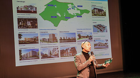 Wethouder Jan Willem Mijnans (Wonen) van de gemeente Nissewaard vertelt over de nieuwste nieuwbouwprojecten op de Woonmarkt.
