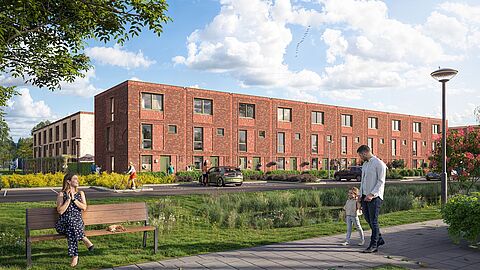 Rij nieuwbouw eengezinswoningen met rode bakstenen en platte daken in fase 2 van De Groene Warande in Spijkenisse.